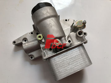 เครื่องยนต์ D6D ฝาปิดน้ำมันคูลเลอร์ Assy สำหรับชิ้นส่วนเครื่องยนต์ดีเซล